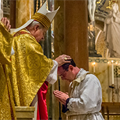 Archbishop Carlson ordains two men to sacred priesthood