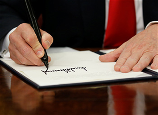 After outcry, Trump signs executive order seeking resolution to family separation policy
