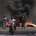 As Haiti descends into more chaos, priests vow to stay and minister to the people