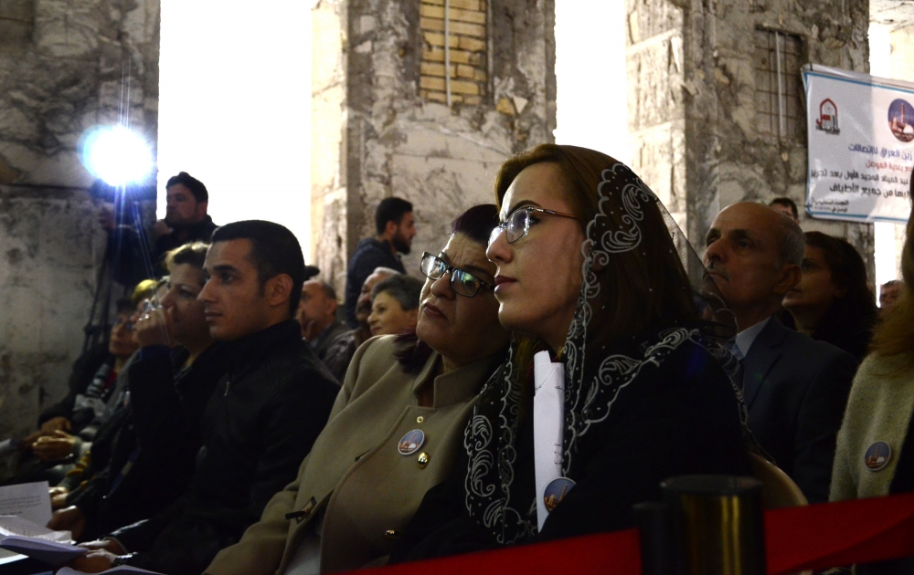 Chaldean Christians in Mosul, Iraq, attend Christmas Mass at St. Paul Cathedral Dec. 24.