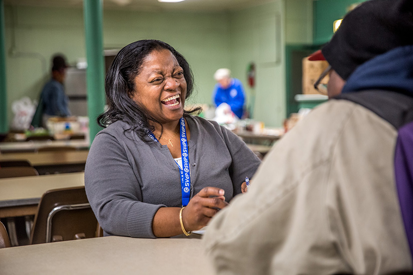 Eddiemae Brown is a volunteer for the St. Vincent de Paul Society at Our Lady of the Holy Cross Parish in the Baden neighborhood of north St. Louis. She helped a client on April 17.