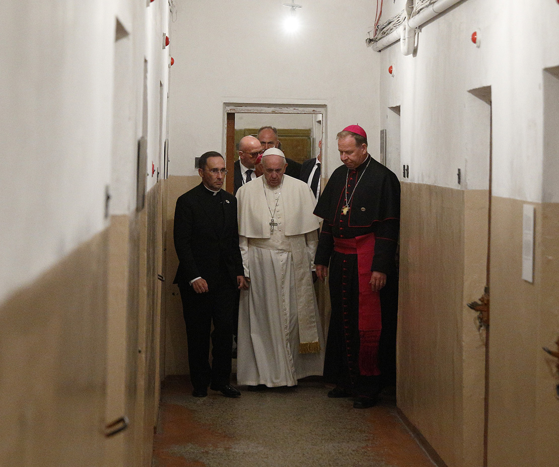 Pope Francis walked with Archbishop Gintaras Grusas of Vilnius as he visited the prison area in the Museum of Occupations and Freedom Fights in Vilnius, Lithuania, Sept. 23.