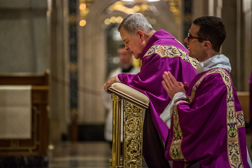 Archbishop Robert J. Carlson prayed at the end of a Mass of Reparation Sept. 7 at the Cathedral Basilica of Saint Louis.