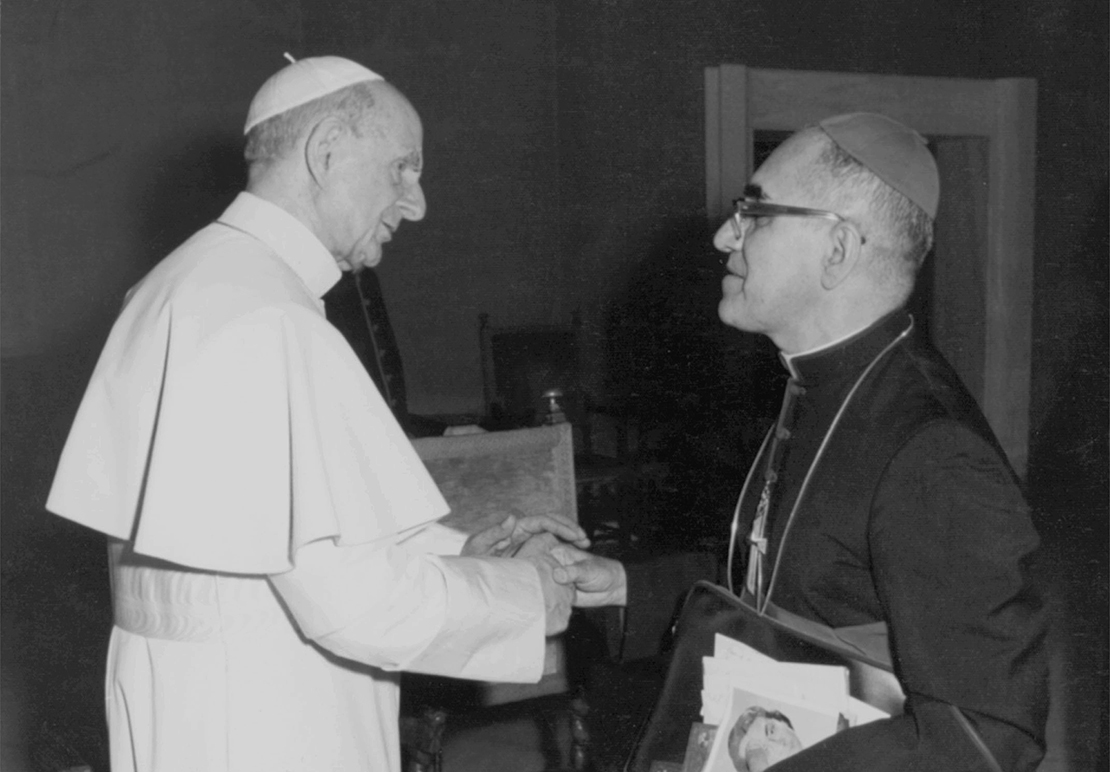 Blesseds Paul VI and Oscar Romero, who are both among seven new saints Pope Francis was to canonize Oct. 14 at the Vatican, talked with each other in an undated photo.