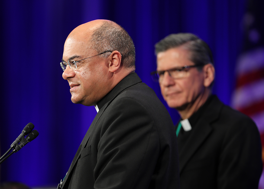 Bishop Shelton J. Fabre of Houma-Thibodaux, La., spoke Nov. 13 at the fall general assembly of the U.S. Conference of Catholic Bishops in Baltimore. Looking on is Archbishop Gustavo Garcia-Siller of San Antonio.