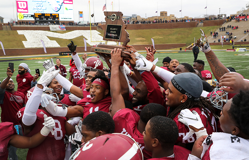 Trinity Catholic High School players celebrated their state title Dec. 1. Trinity defeated Cardinal Ritter Preparatory High 45-19 in the Missouri State High School Activities Association Class 3 football championship game at Faurot Field in Columbia, Mo.