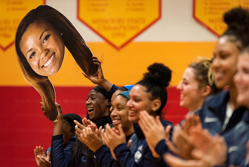 A giant cutout of Incarnate Word Academy alumna Napheesa Collier was waved by one of her current teammates from the University of Connecticut at a ceremony honoring the Incarnate Word basketball team, coaches and players. Collier’s number was retired and fans, alumnae and players celebrated the program being named to the Missouri Sports Hall of Fame earlier this year. The UConn team was in St. Louis to play Saint Louis University Dec. 4.