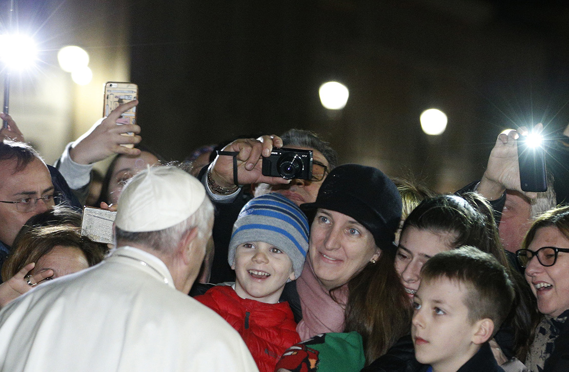 Pope Francis greeted people after visiting the Nativity scene in St. Peter’s Square Dec. 31.