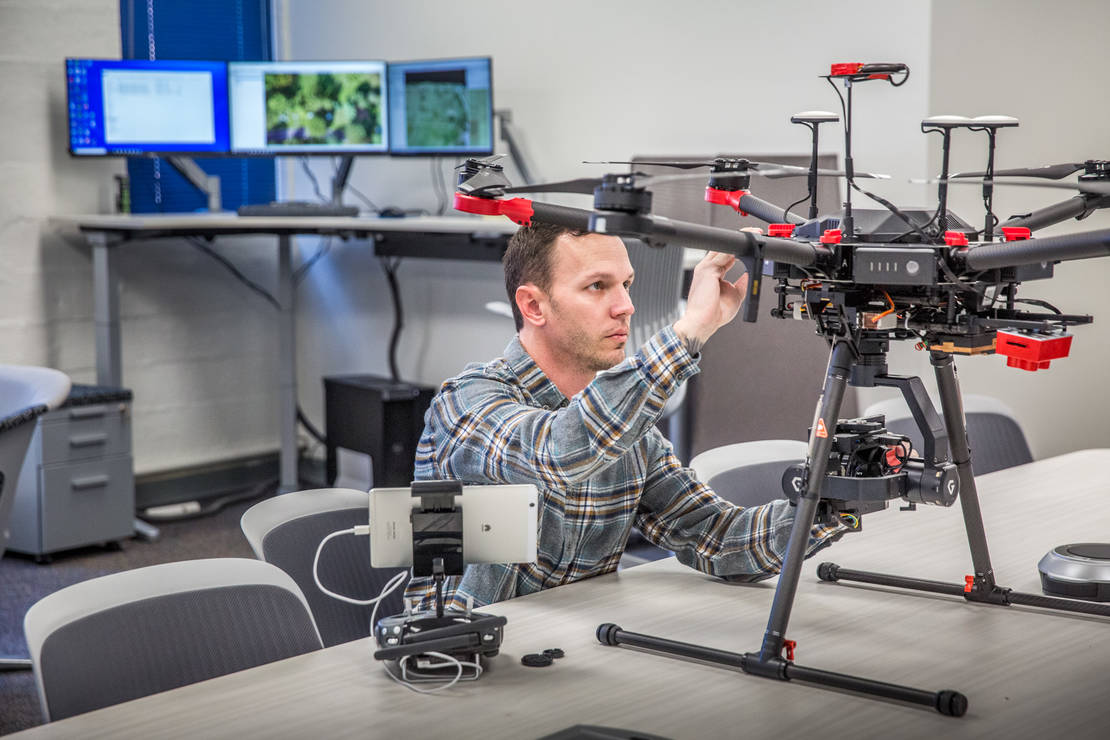 Doctoral student Sean Hartling worked on calibrating an infrared heat sensing camera on a drone used for atmospheric research at the Remote Sensing Lab on the Saint Louis University campus on Jan 8, 2019.Vasit Sagan, Ph.D. runs the Department of Earth & Atmospheric Sciences at Saint Louis University where their remote sensing lab employs high tech imaging systems paired with drones to collect and analyze data for atmospheric study.