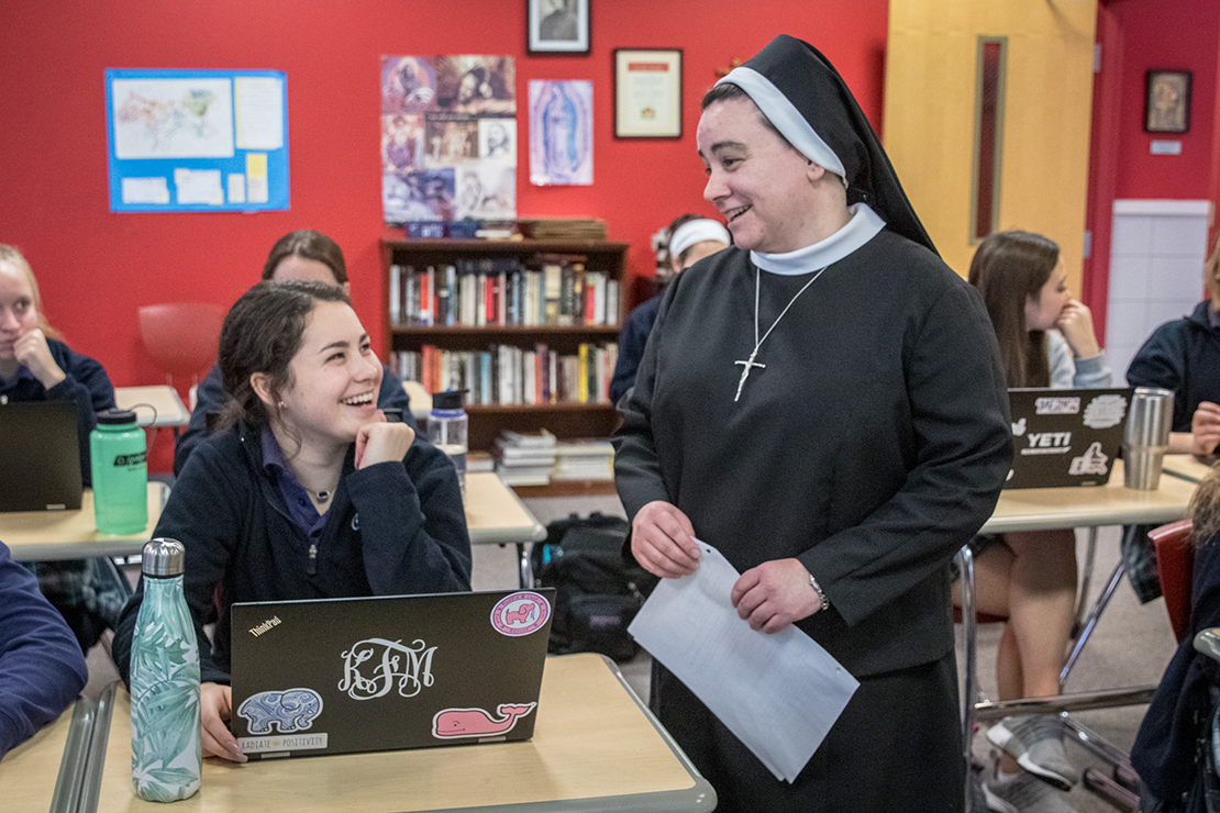 Sister Catherine Brodersen, ASCJ, talked with Kelly Fleming in a sophomore theology class Jan. 16 at Cor Jesu Academy. Cor Jesu incorporates Jesuit Father Robert Spitzer’s The Reason Series — on the relationship between faith and science — into sophomore theology with positive results, increasing students’ faith.