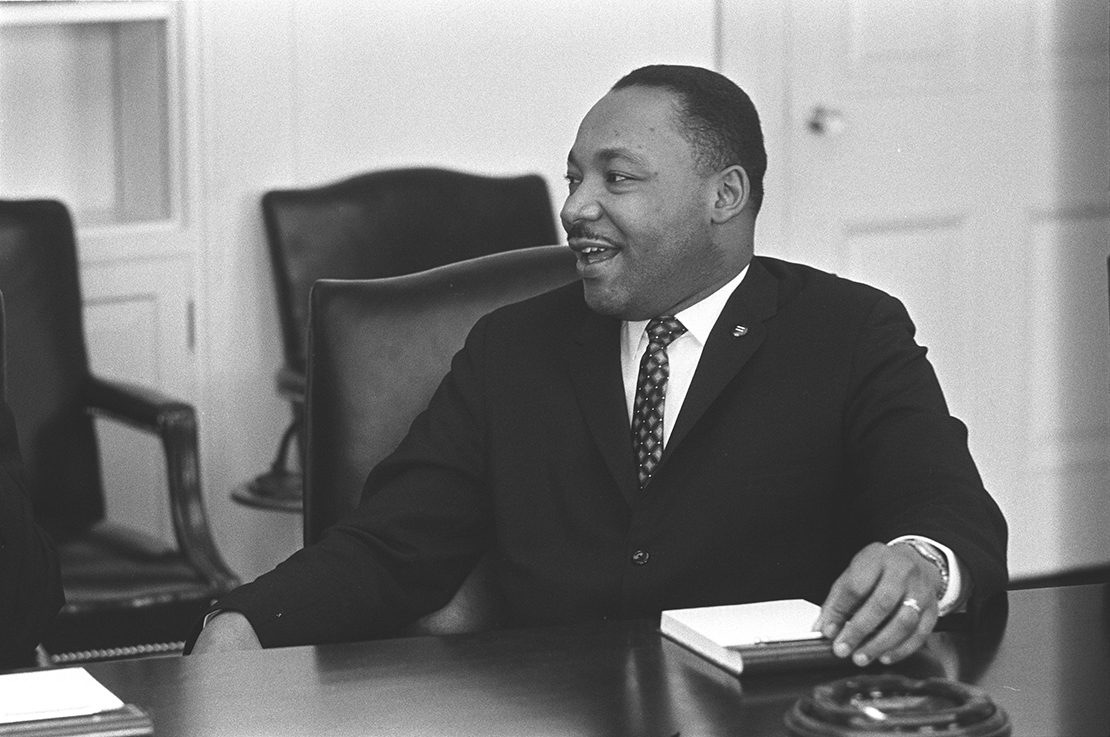 Civil rights leader the Rev. Martin Luther King Jr. smiled during a talk with U.S. President Lyndon B. Johnson, not pictured, in this undated photo.