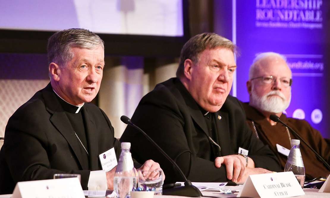Chicago Cardinal Blase J. Cupich, left, spoke Feb. 1 at a panel discussion at the Leadership Roundtable’s Catholic Partnership Summit in Washington to propose solutions to the Church’s sex abuse crisis. He is joined at the table by Cardinal Joseph W. Tobin of Newark, N.J., center, and Boston Cardinal Sean P. O’Malley.