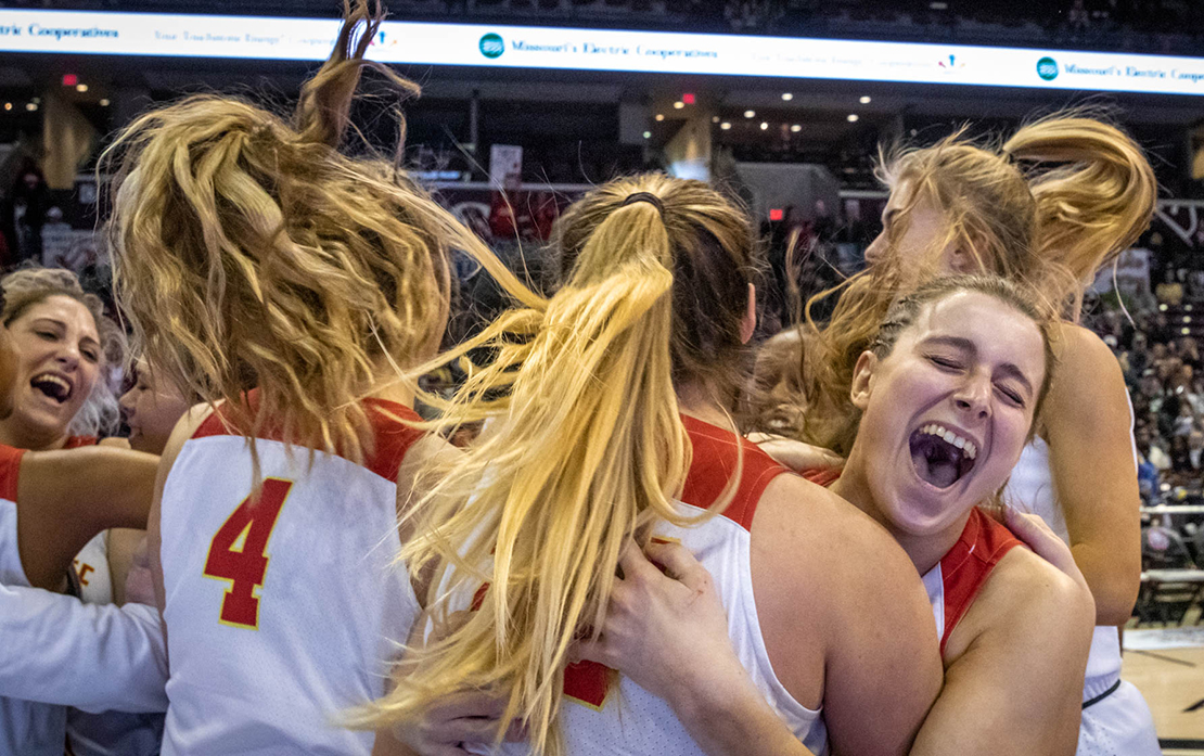 Samantha Eaker, right, embraced teammate Kiki Britzmann after Incarnate Word Academy won its 10th state basketball title March 16 in Springfield. Incarnate Word defeated Lincoln College Prep 61-35.