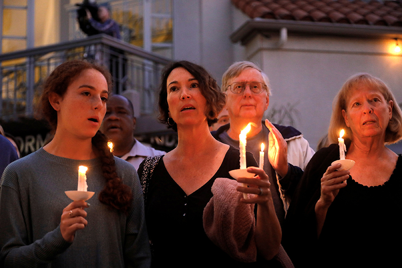 People participated in a candlelight vigil April 27 at Rancho Bernardo Community Presbyterian Church for victims of a shooting incident at the Congregation Chabad synagogue in Poway, Calif., near San Diego. In response to the shooting, Cardinal Daniel N. DiNardo of Galveston-Houston and president of the U.S. Conference of Catholic Bishops, wrote in a statement April 28: "Our country should be better than this; our world should be beyond such acts of hatred and anti-Semitism." 