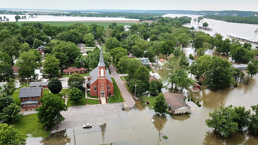 Flood waters are rising in the town of Portage Des Sioux and around St. Francis of Assisi Parish. The 8 a.m. Sunday Mass has been suspended until the water recedes. The Mississippi River at Grafton, Ill., is at 34.43 feet and was predicted to crest at 36 feet by June 6. The record crest at Grafton was 38.17 feet on Aug. 1, 1993.