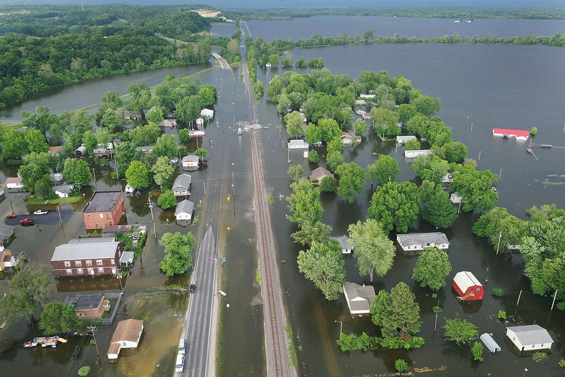 Floodwater from the Mississippi River inundate Foley in early June. St. Vincent de Paul conferences and Catholic Charities of St. Louis are working to assist flood victims.