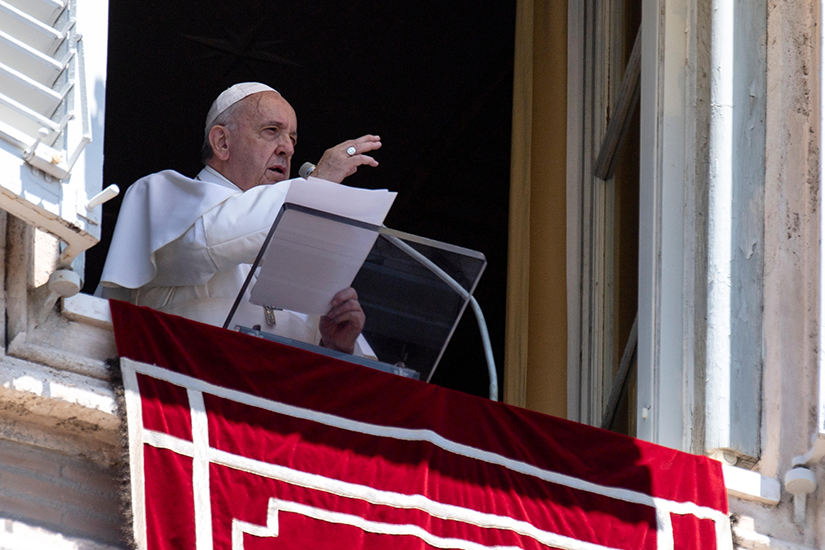 Pope Francis gave a blessing as he led the Angelus from the window of his studio overlooking St. Peter’s Square June 30.