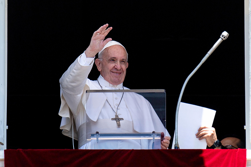 Pope Francis waved after leading the Angelus from the window of his studio overlooking St. Peter’s Square at the Vatican June 30.