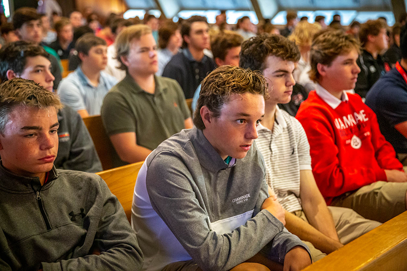 Sophomore Conner Fulton sat with other members of the Maucerc House in the chapel at Chaminade College Preparatory High School in Creve Coeur.