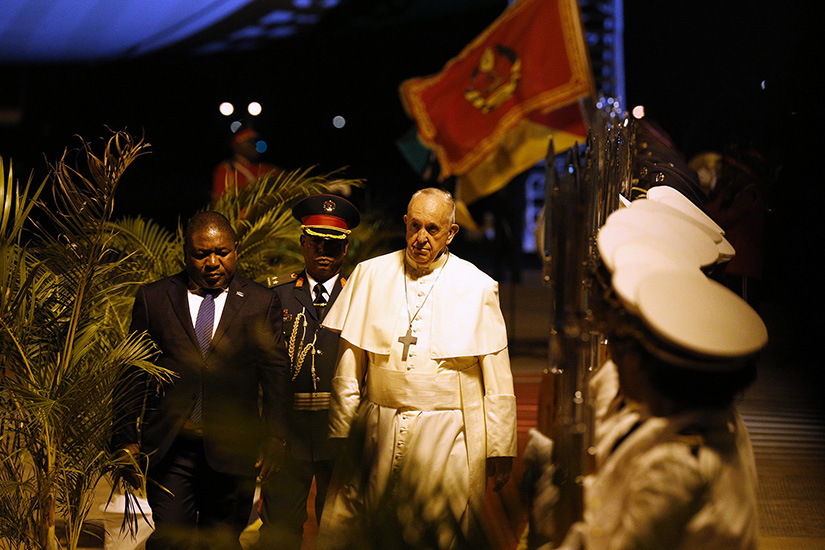 Pope Francis walked with President Filipe Nyusi of Mozambique at Maputo International Airport Sept. 4, after the pope’s arrival for a weeklong visit to Mozambique, Madagascar and Mauritius.