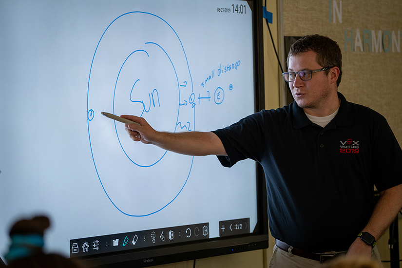 Michael Plas, a science teacher at St. Agnes School in Louisville, Ky., taught a lesson to sixth-graders Aug. 21. The school has integrated environmental awareness across its curriculum.
