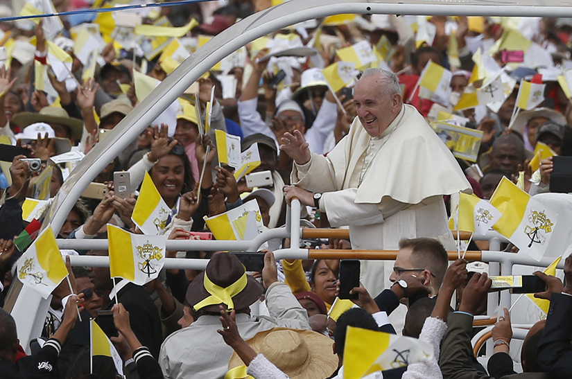 Pope Francis greeted the crowd before celebrating Mass at the Soamandrakizay diocesan field in Antananarivo, Madagascar, Sept. 8.