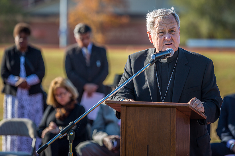 Archbishop Robert J. Carlson led an interfaith prayer service to end gun violence in St. Louis at Cardinal Ritter College Prep High School on Oct. 21