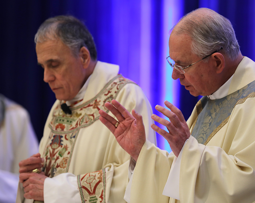 Cardinal Daniel N. DiNardo of Galveston-Houston, president of the U.S. Conference of Catholic Bishops, and Archbishop Jose H. Gomez of Los Angeles, vice president, concelebrated Mass at the fall general assembly of the USCCB in Baltimore Nov. 11.