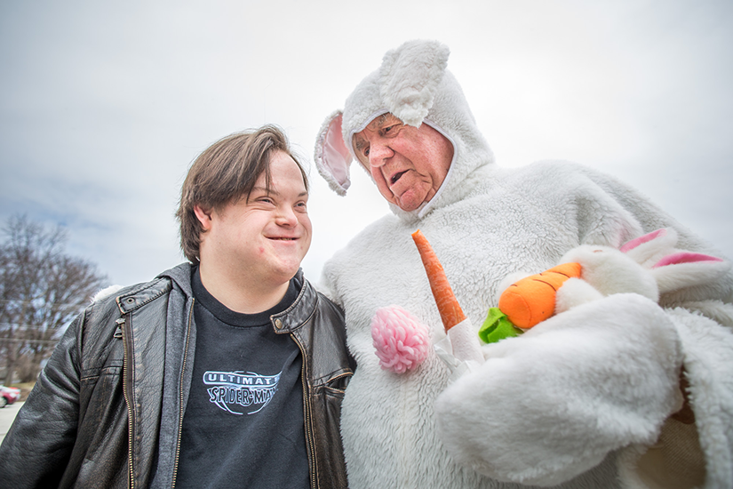 Cody Fingers smiled as he talked with Paul Politte, aka the Easter Bunny, at the Our Lady of Fatima Knights of Columbus 33rd annual Easter egg hunt for children and adults with disabilities on March 25. Politte has dressed in his costume for all 33 years.