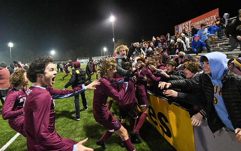De Smet players celebrated with the student section after winning the MSHSAA Class 4 boys championship soccer game against Lee's Summit in the 13th round of penalty kicks on Nov. 23 at World Wide Technology Soccer Park in Fenton.