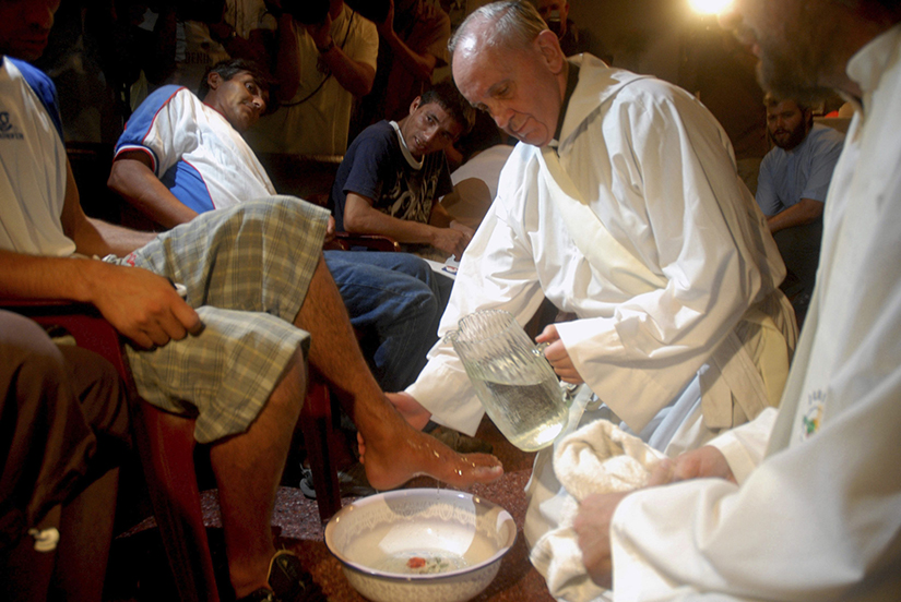 Argentine Cardinal Jorge Mario Bergoglio washed the feet of residents of a shelter for drug users during Holy Thursday Mass in 2008 at a church in a poor neighborhood of Buenos Aires, Argentina. Pope Francis was ordained a priest for the Society of Jesus on Dec. 13, 1969.