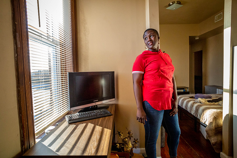 Pathways to Progress graduate Tyra Brown is pictured at her home in south St. Louis Dec. 10. Brown signed up with Pathways in January of 2017, saying she liked that the program offered intensive, wrap-around case management and support services. The program helps individuals toward stability and long-term economic independence.