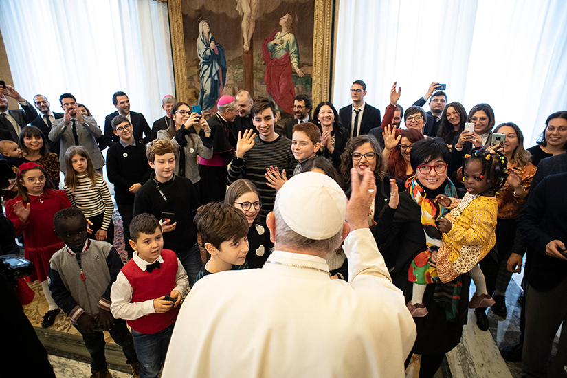 Pope Francis greeted young members of Italy’s Catholic Action at the Vatican Dec. 16.