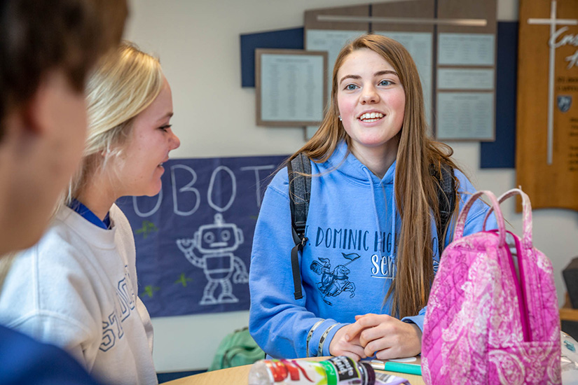 Alyssa Buchheit talked with friends during St. Dominic High School’s “hour of power” in O’Fallon. Buchheit, who volunteers with several organizations, is one of the 2020 Dr. Martin Luther King Model of Justice awardees.