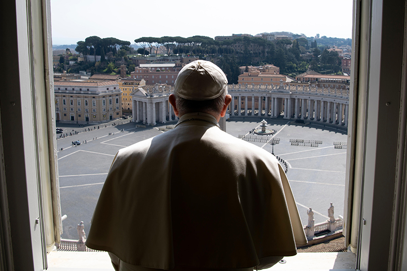 Pope Francis looked over an empty St. Peter's Square after leading a livestream of the recitation of the Angelus from the library of the Apostolic Palace March 22. The pope will give an extraordinary blessing "urbi et orbi" (to the city and the world) at noon St. Louis time March 27 in an "empty" St. Peter's Square because all of Italy is on lockdown to prevent further spread of the coronavirus. 