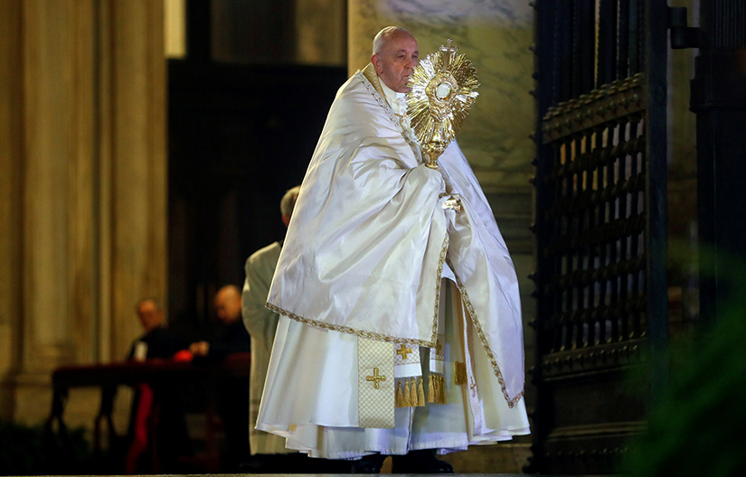 Pope Francis held the monstrance as he gave his extraordinary blessing “urbi et orbi” (to the city and the world) from the atrium of St. Peter’s Basilica at the Vatican March 27. The blessing was livestreamed because of the coronavirus pandemic.