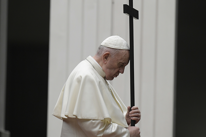 Pope Francis led a Via Crucis procession in St. Peter’s Square at the Vatican April 10. The Good Friday service was held with no public participation because of the COVID-19 pandemic.