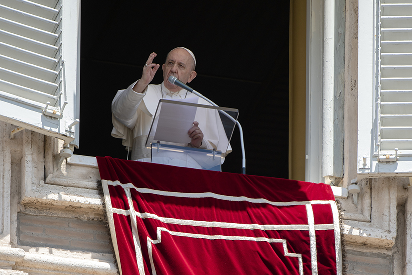 Pope Francis led the Angelus from the window of his studio overlooking St. Peter’s Square at the Vatican June 7. The pope urged people to not declare victory against COVID-19 but continue to be careful and follow health precautions.