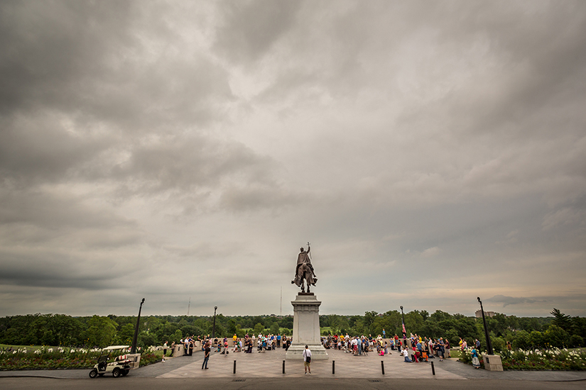 Catholics prayed at the Apotheosis of Saint Louis statue in Forest Park on July 1.