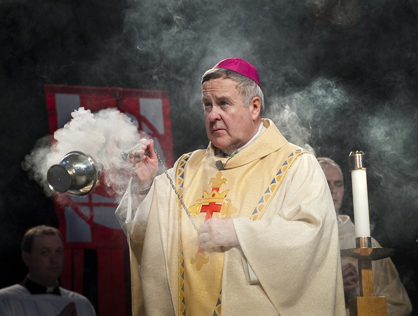 Archbishop Robert J. Carlson incensed the altar at Mass during a day of spiritual conferences at the Chaifetz Arena on the campus of Saint Louis University in 2010.