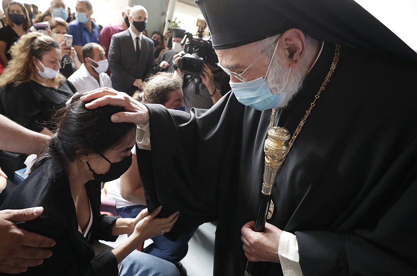 Metropolitan Elias Audi, bishop of the Greek Orthodox Church of Antioch for the Archdiocese of Beirut, offered condolences to families of four nurses of the Saint George Hospital University Medical Center who died in the Tuesday explosion at the seaport of Beirut, during a mass in Beirut, Lebanon, on Aug. 6.