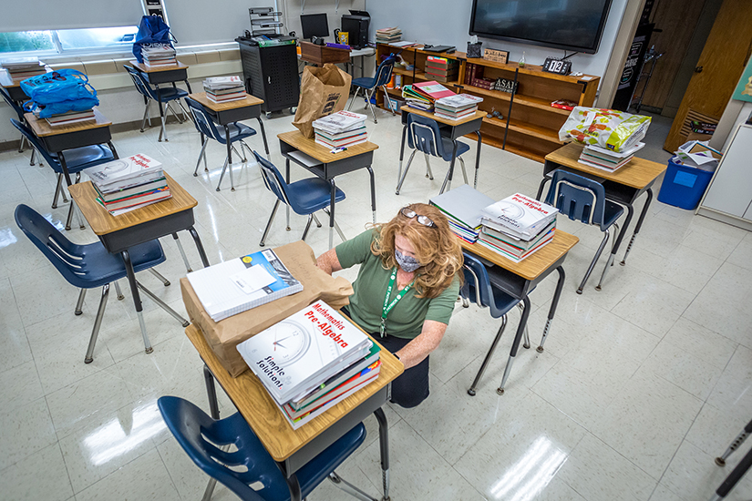 Kelli Prade, a seventh-grade teacher at St. Patrick School in Wentzville, put names on her students’ desks Aug. 12.