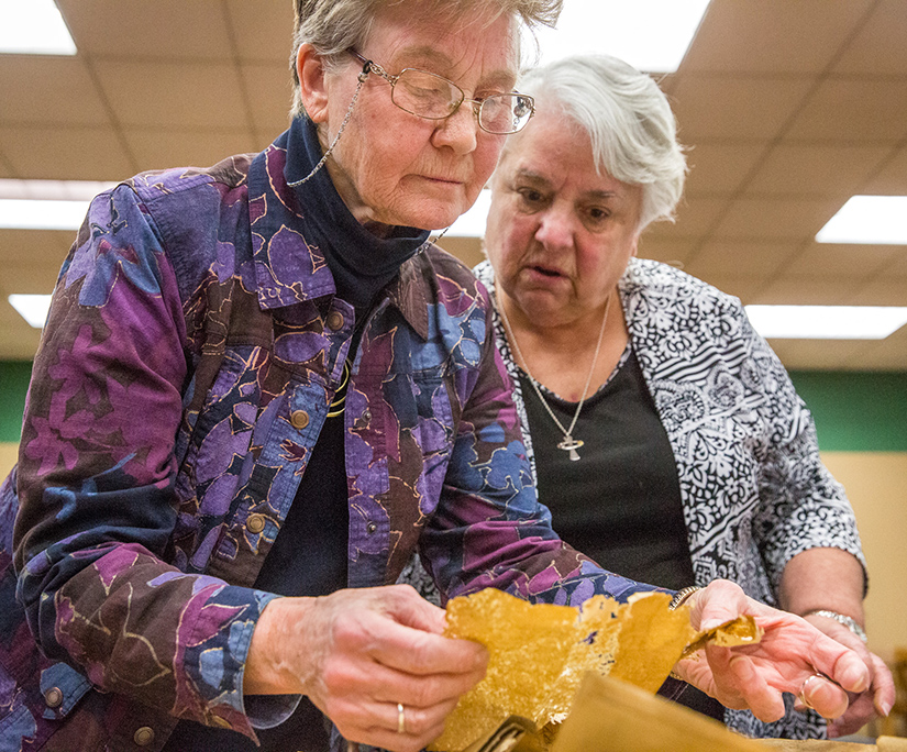 Sister Jane Behlmann, CSJ, archivist for the Sisters of St. Joseph of Carondelet, and Sister Marilyn Lott, CSJ, read a letter written by a member of her order explaining the sister’s history in coming from France to St. Louis to teach the deaf. The letter was found in a time capsule that was opened on March 28.