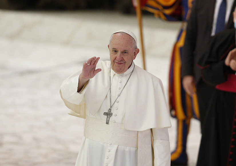 Pope Francis greeted the crowd during his general audience in the Paul VI hall at the Vatican Oct. 21.