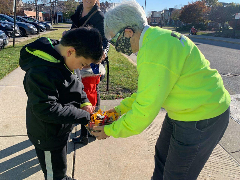 Sister Reg McKillip handed out candy at a polling place Nov. 3 in Wisconsin.