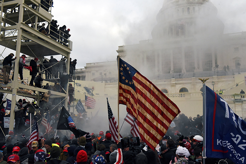 Supporters of President Donald Trump gathered in front of the U.S. Capitol in Washington Jan. 6. During the day, some people breached the security and entered the Capitol building, forcing a temporary halt to Congress' count of electoral votes. One woman was shot and killed and three other people died of "medical emergencies."