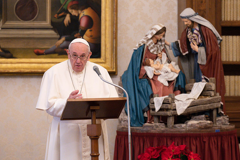 Pope Francis led the Angelus prayer from the library of the Apostolic Palace at the Vatican Jan. 10.
