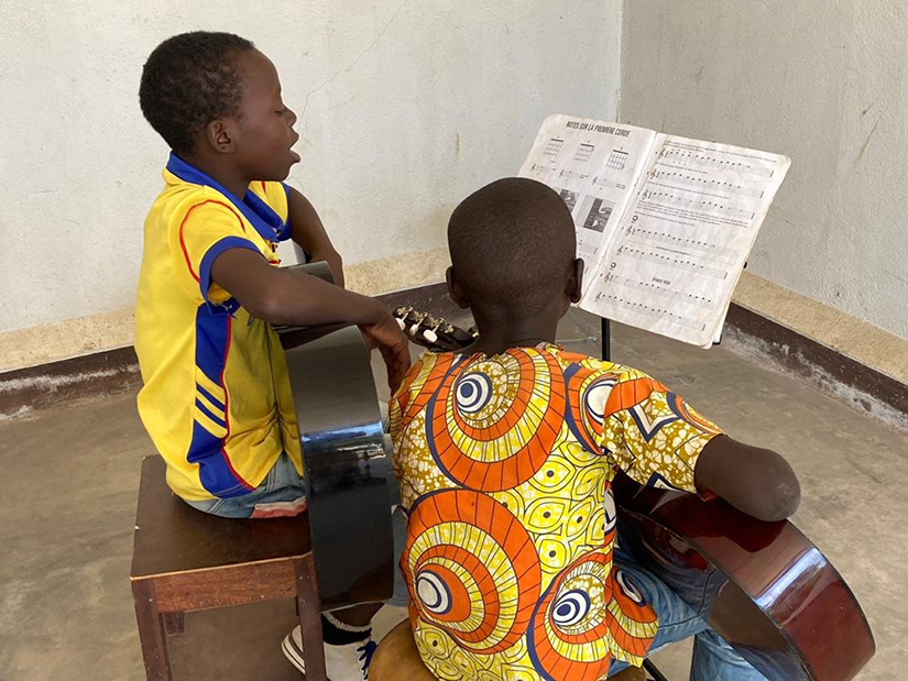 Students are pictured in an undated photo rehearsing at the African Music School in Bouar, Central African Republic.