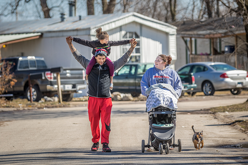 Dakota and Nicole Roper took a walk with their 6-year-old daughter Sophia, 5-week-old daughter Lakota, and dog Freddie. The Ropers received emotional and moral support from Barb Buhmann, an area life coordinator with the Society of St. Vincent de Paul’s new Pregnancy Care Program. “When I got out of the ICU, (Barb Buhmann) checked on me every day and sent me pictures or Bible verses and stories to try and uplift my spirits,” Roper said of Buhmann.