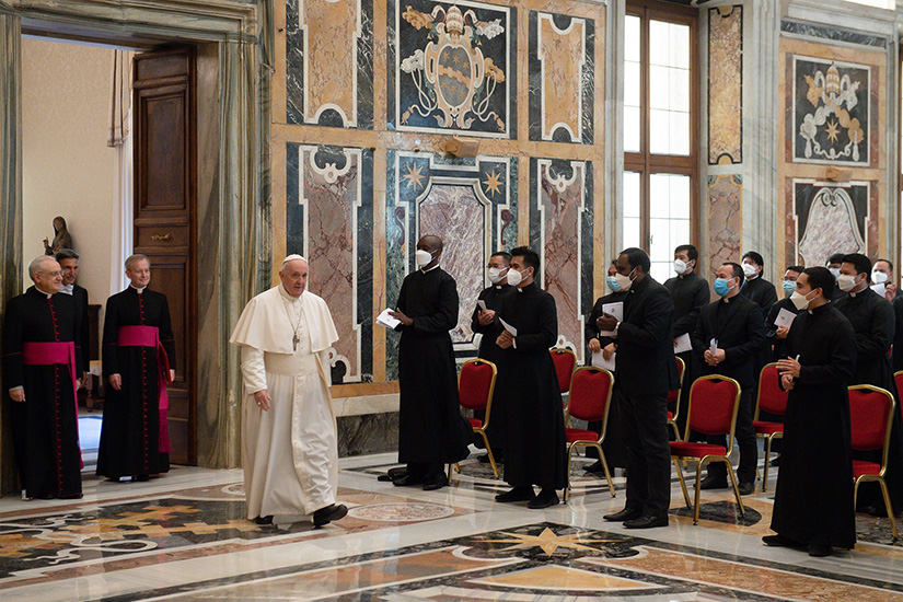Pope Francis arrived for an audience with priests studying at the Pontifical Filipino College, at the Vatican March 22. The pope encouraged Filipino priests doing graduate studies in Rome not to think of their time there as a pause disconnected from their “real” lives.